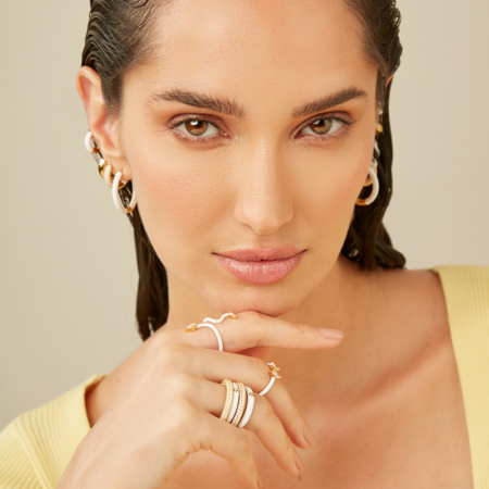 Woman wearing Giving Gems Jewelry